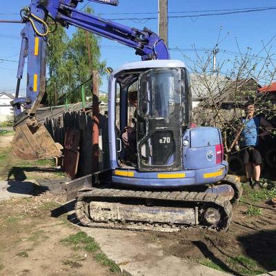 Копка переливного колодца в очень стеснённых условиях.